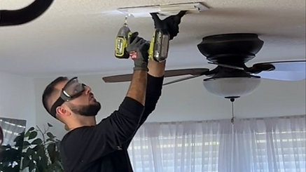 Technician performing air duct cleaning in a Jacksonville, FL home